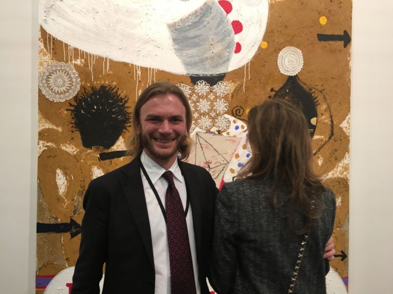 Gabriele Gaspari Magazzino con Ouattara Watts Armory Show 2016 Facce da Armory Show. Abbiamo chiesto ai galleristi italiani di posare con un'opera del loro stand: ecco il risultato