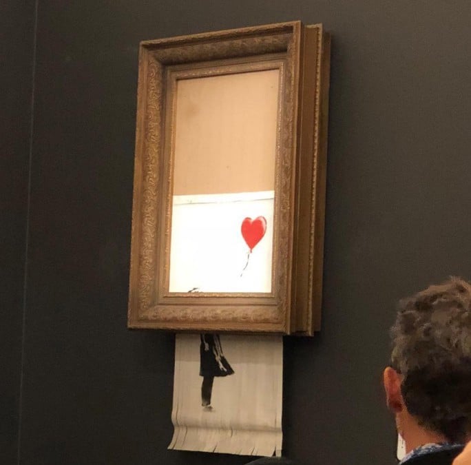 Banksy, l'opera da 1 milione di dollari si autodistrugge dopo l'asta da  Sotheby's - Il Sole 24 ORE