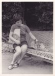 Anonimo, Simone sitting with a Lion Cub, Bioparco di Roma, 1968