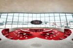 The Sunken Lounge at the TWA Hotel boasts a split flap departures board by Solari di Udine — and a view of the hotel’s restored 1958 Lockheed Constellation “Connie”. Photo credits TWA Hotel – David Mitchell