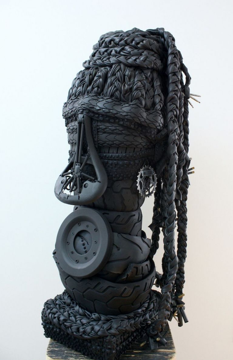 Kim Dacres, Amanda, 2019, Auto tires, bicycle tires, bike tubes, wood, bicycle parts, zip ties, screws, gears, matte black spray paint, 102x41x41cm, Anna Marra Arte Contemporanea, Roma