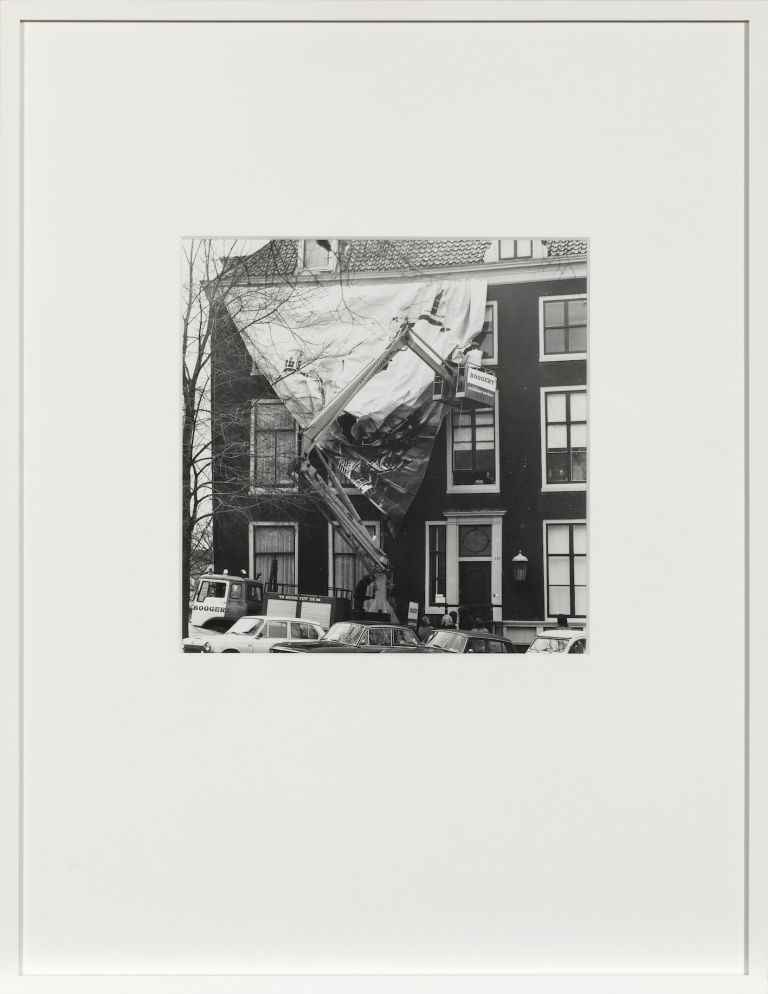 Ulay, The Metamorphosis of a Canal House, 1972, Series of 6 unique Gelatine Silver Prints, documentation of an environmental action: installation of a giant photo on photographic linen, showing a petrochemical refinery, 10 x 12 m 58 x 45 cm (framed), 20 x 23 cm. Courtesy ULAY Foundation