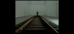 Dani Karavan, Man walking on railways, 1989. Still da video