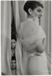 Milano, 1° maggio 1958. Maria Callas prova abiti nell'atelier BIKI. Fotografo Franco Gremignani – Publifoto. Stampa fotografica alla gelatina bromuro d’argento 32,3 x 21,8 cm