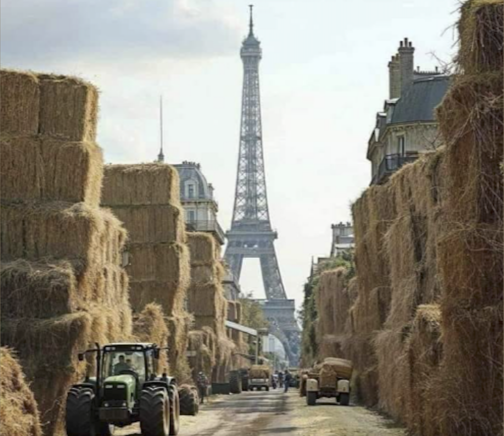 Tour Eiffel invasa da balle di fieno e trattori. via profilo Instagram di Vincent Smadja