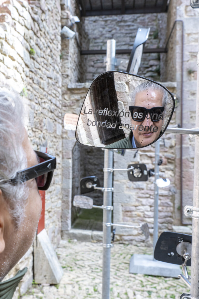 Carlos Garaicoa riflesso in Soñamos en la superficie rayada de un cristal, installation view at Rocca Maggiore, Assisi, 2024. Photo Ela Bialkowska - OKNO studio photography