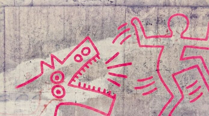 Il graffito di Haring. Photo Massimo Di Felice via Soprintendenza Roma, mostra "Cross the Streets" Macro 2017