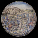 Manifattura urbinate, Battaglia di Anghiari, XVII-XVIII secolo, Maiolica policroma, Ø 42 cm Luogo di conservazione Banca di Anghiari e Stia – Sede, via G. Mazzini 17, Anghiari (AR) 