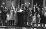 The local inhabitants of Alencon welcoming the American soldiers who liberated the city Normandy